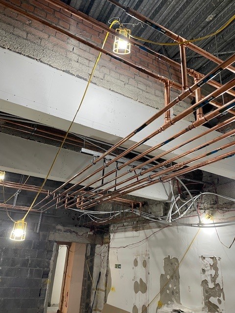 Fireproofed steel beam